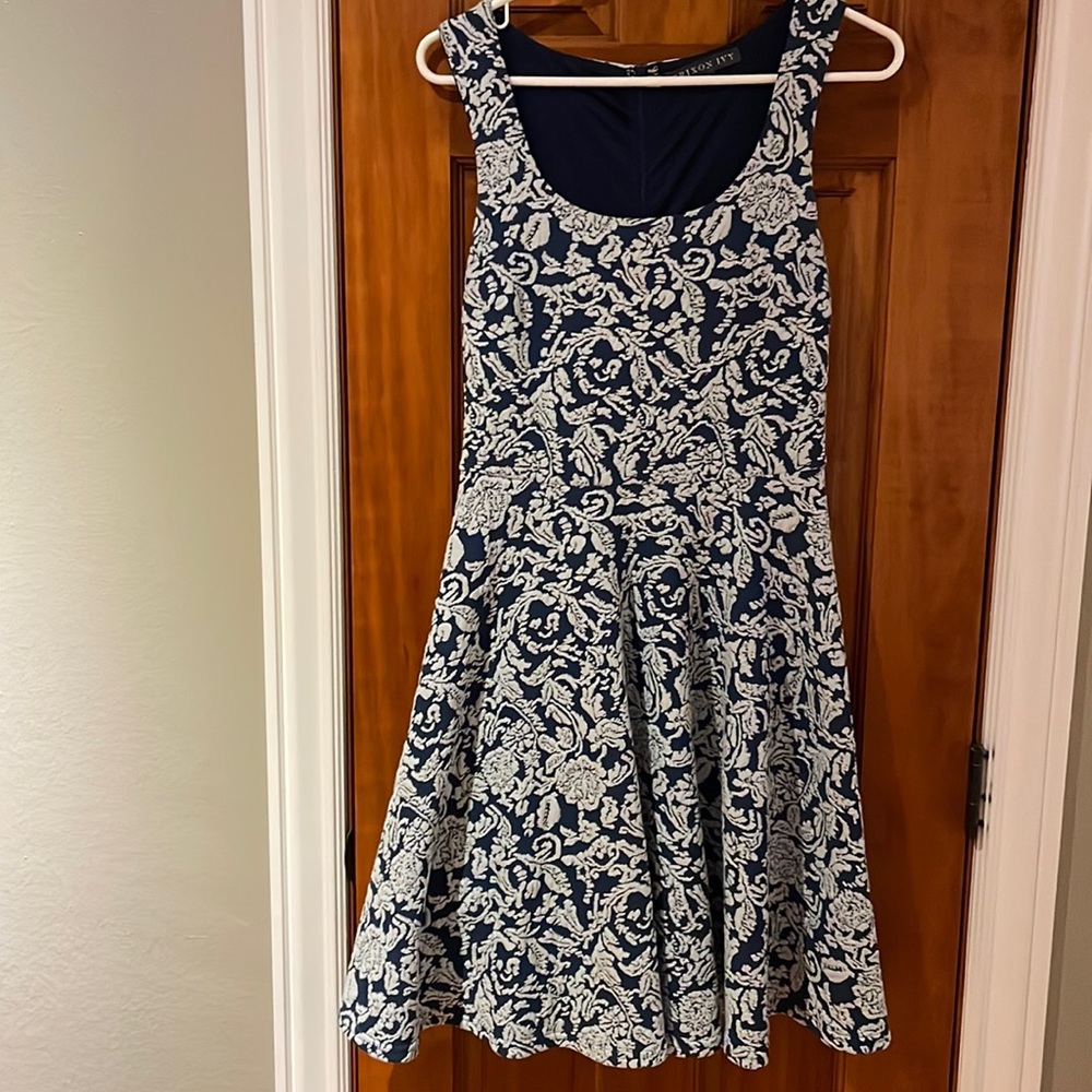 Brixon Ivy dress in blue with white floral/paisley-ish print. Adorable on!